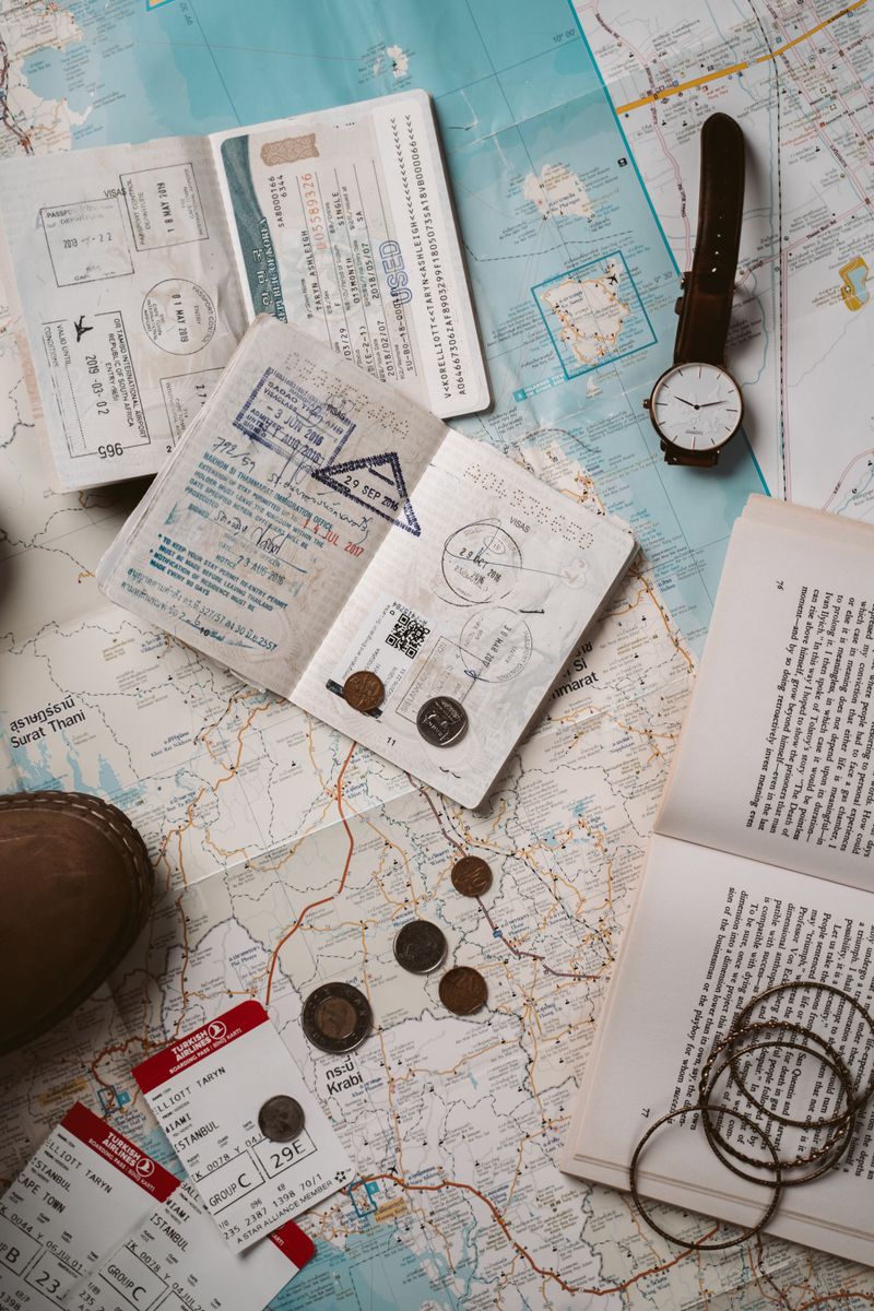Passport and travel documents on a map